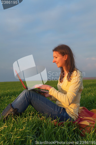 Image of Teen girl with a laptop