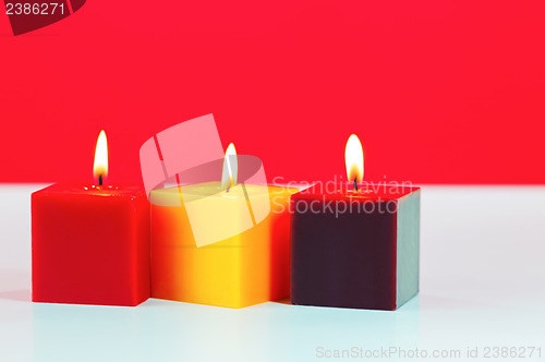 Image of Three burning candles