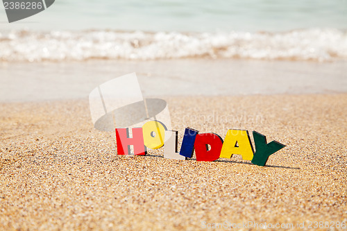 Image of Wooden colorful word 'Holiday'
