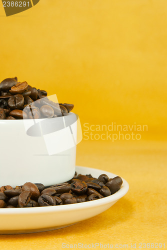 Image of Cup full with coffee beans