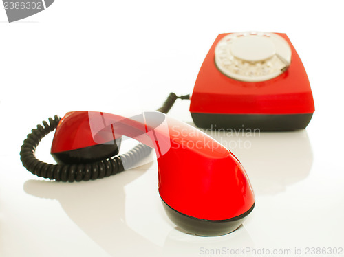 Image of Red old fashioned telephone - Contact us concept
