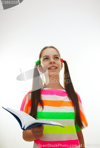 Image of Teenage girl with a book