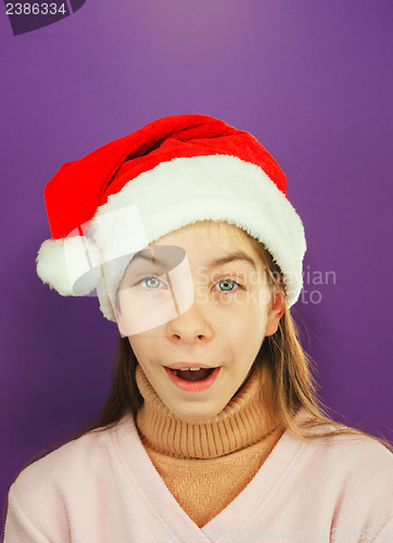Image of Pretty Santa girl, closeup portrait of a teen girl wearing Chris