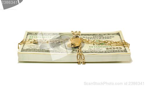 Image of Stack of US 100 dollar bills chained and locked