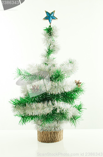 Image of Decorated Christmas tree over white background