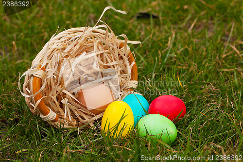 Image of Basket with the colorful Easter eggs