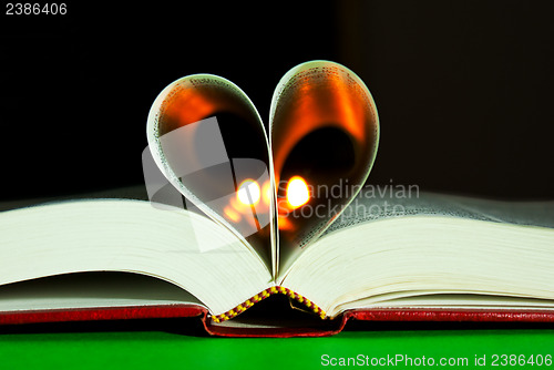 Image of Open book laying on the table