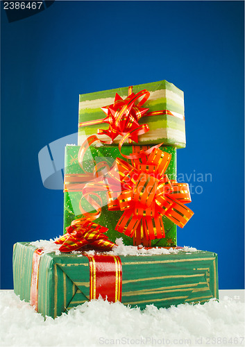 Image of Christmas presents against blue background