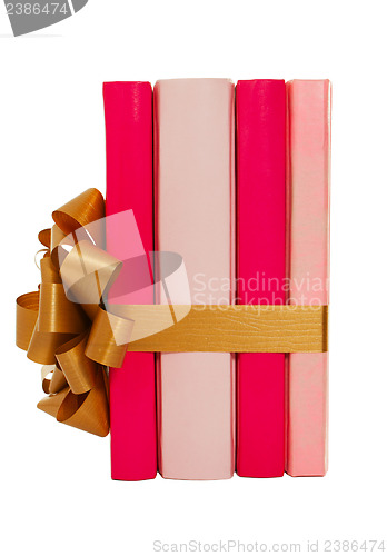 Image of Four books tied up with ribbon