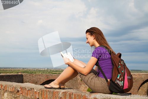 Image of Teen girl reading the Bible