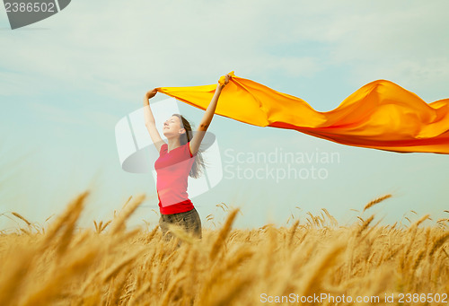 Image of Teen girl at a wheat field