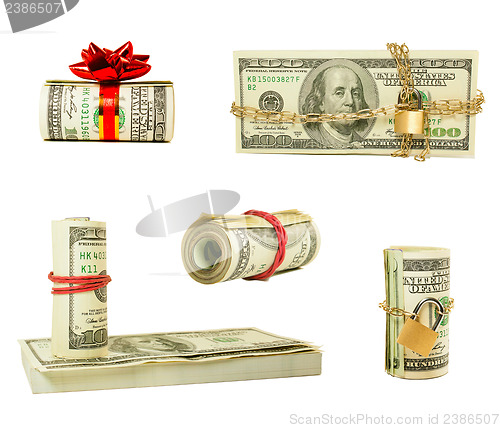Image of Set of wads and stacks of US one hundred dollar bills