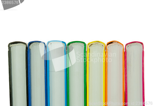 Image of Row of colorful books' spines