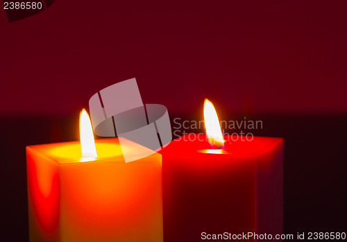 Image of Two burning candles