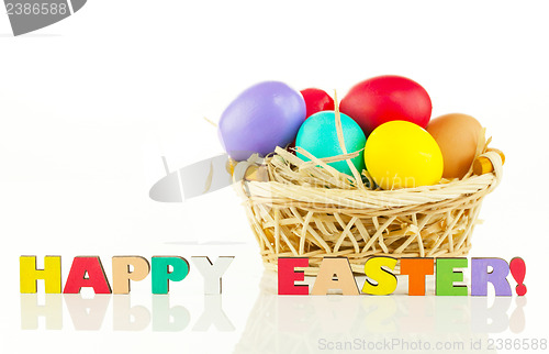 Image of Basket with the colorful Easter eggs