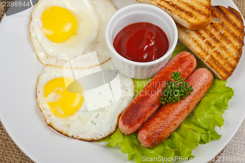 Image of Fried eggs with sausages