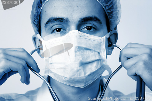 Image of Portrait of a young doctor with stethoscope.