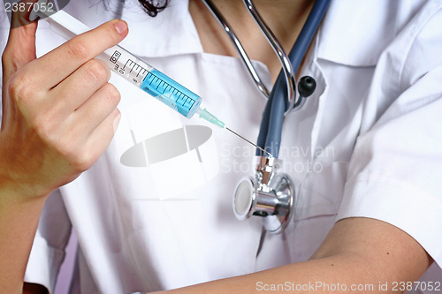 Image of Portrait of a young doctor with stethoscope.