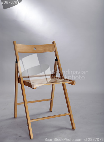 Image of A wood foldable chair