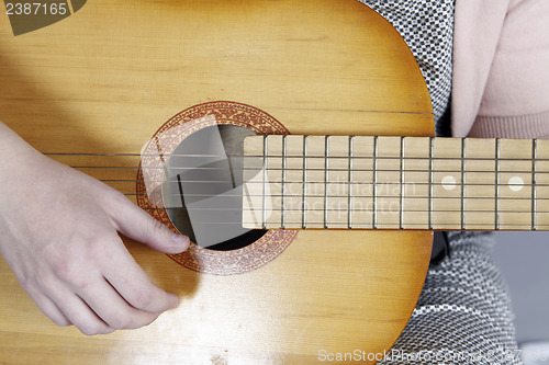 Image of Playing the guitar