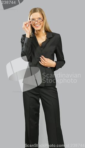 Image of Young beautiful smiling business woman