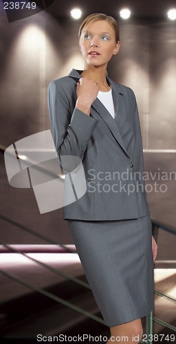 Image of Young beautiful smiling business woman