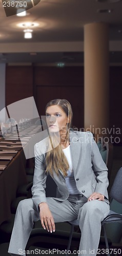 Image of Young beautiful smiling business woman