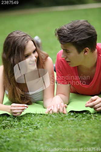 Image of Assectionate teenage couple on a date