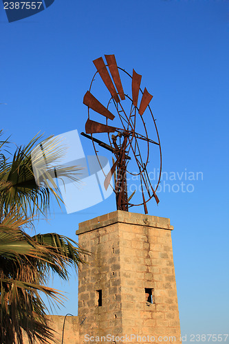 Image of Old broken down windmill