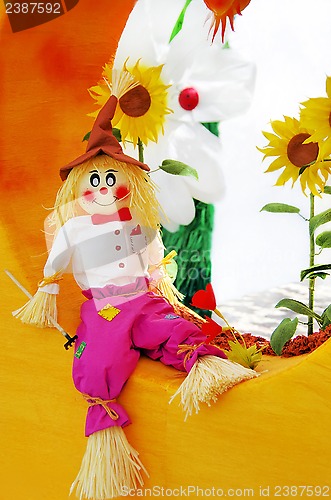 Image of Colorful scarecrow at garden of fantasy