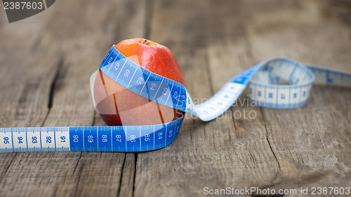 Image of Apple and Measuring tape