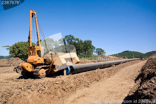 Image of Machine to twist pipes in a pipeline construction