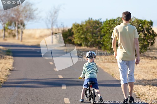 Image of family walking