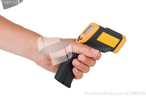 Image of Hand hold a non-contact IR thermometer