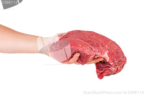 Image of Hand hold raw veal slab