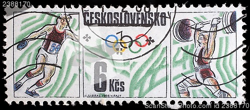 Image of Stamp printed by Czechoslovakia, shows Olympics, table tennis and weightlifting