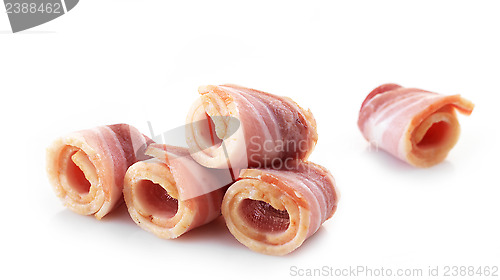 Image of bacon rolls on white background