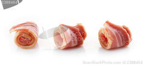 Image of bacon rolls on white background