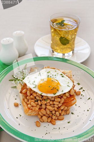 Image of Egg On Baked Beans