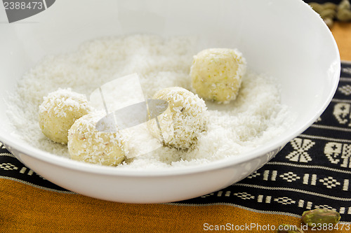 Image of Rolling Burfi In Coconut