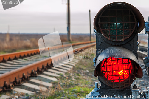 Image of railroad track and stop light