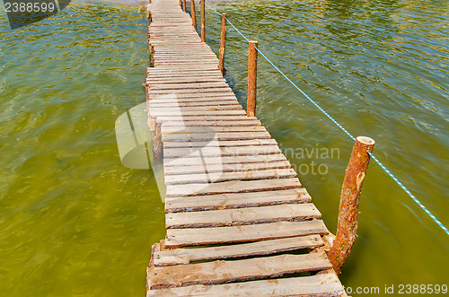 Image of wooden bridge over water