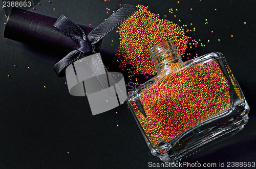 Image of Bottle with colorful nail polish 