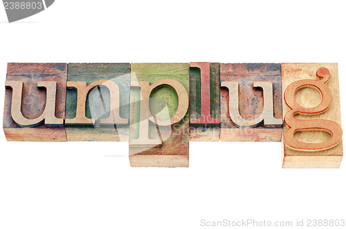 Image of unplug word in wood type