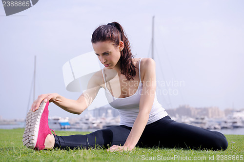 Image of Young beautiful  woman jogging  on morning