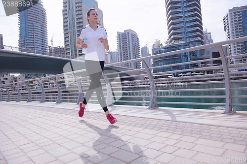 Image of woman jogging at morning