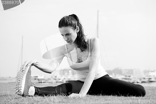 Image of Young beautiful  woman jogging  on morning