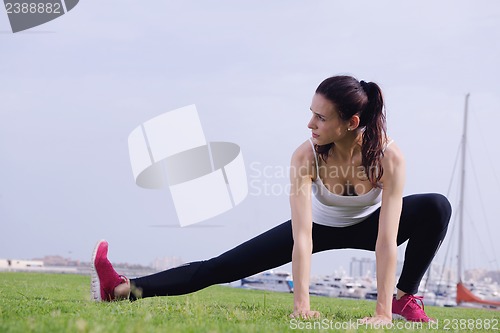 Image of Young beautiful  woman jogging  on morning