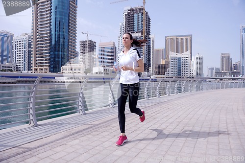 Image of woman jogging at morning