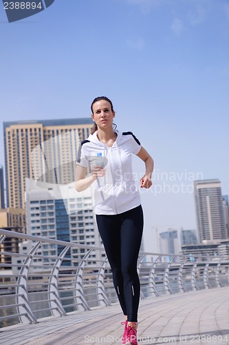 Image of woman jogging at morning